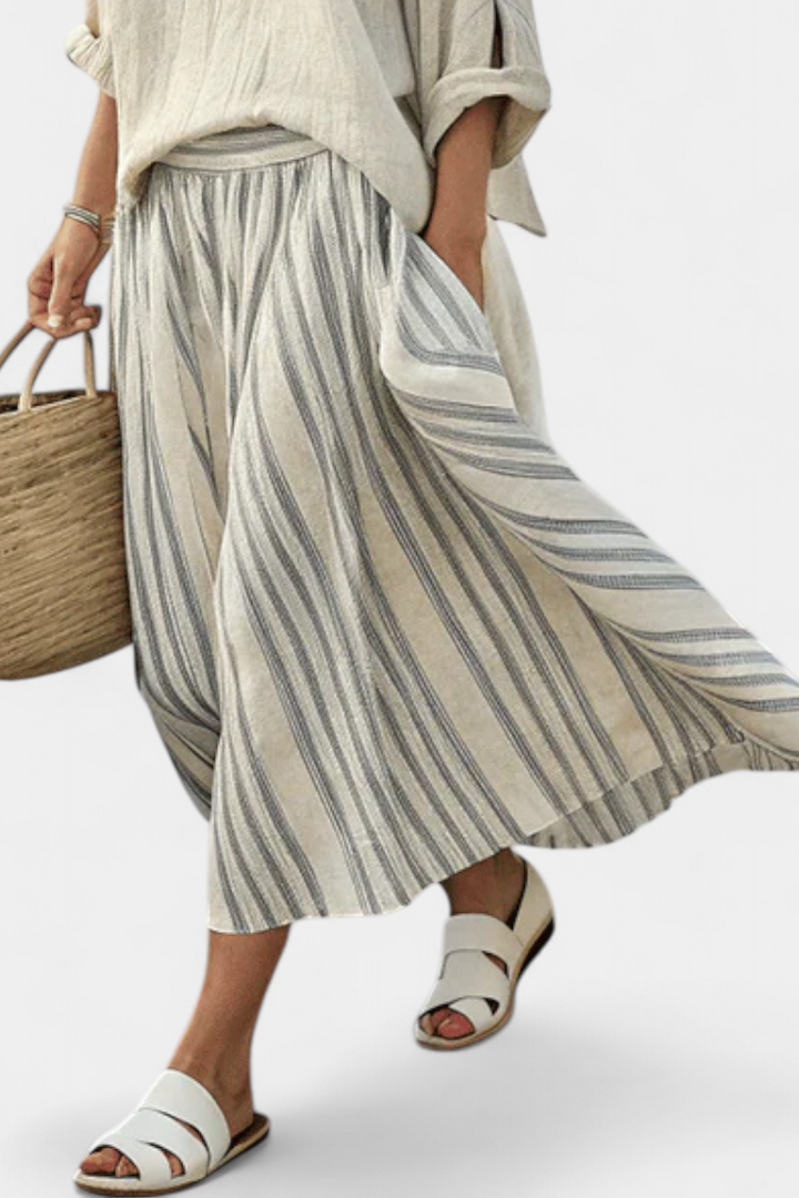 Elegant og Komfortabel Fuld Casual Daisy Sæt: Oversized Bluse med Stribet Midi Nederdel