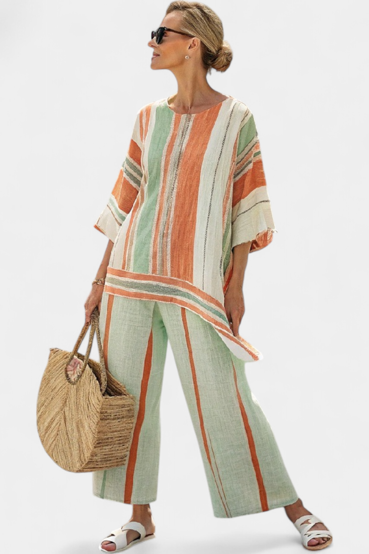 Chic Stribet Sæt med Asymmetrisk Bluse og Bredbenede Bukser til et Sofistikeret Look