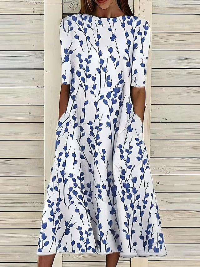 Céleste | Midi-sommerkjole med kystblomster og rund hals