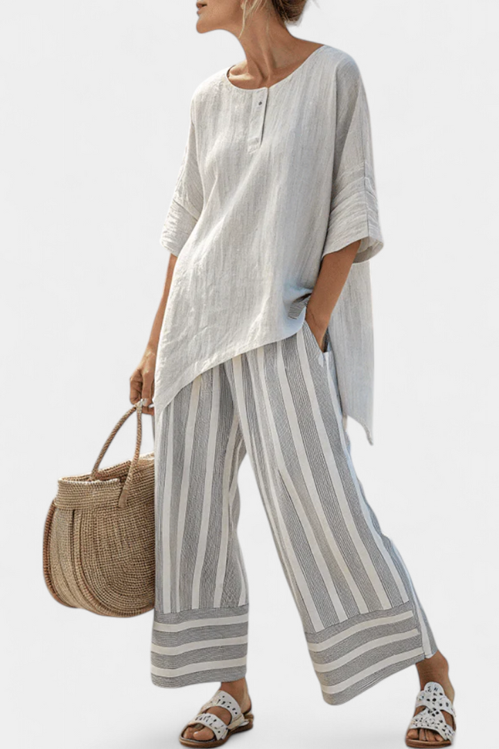 Daisy Asymmetrisk Bluse og Stribede Bukser Sæt til et Chic og Moderne Look