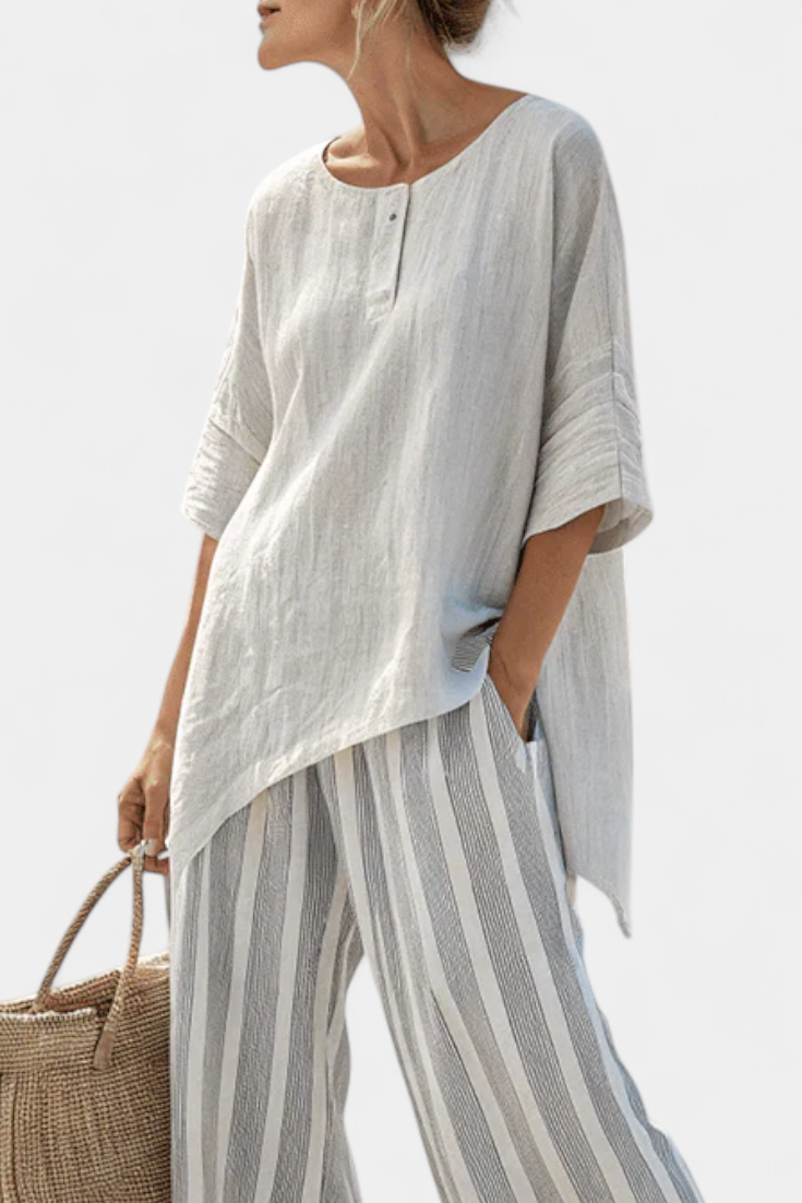 Daisy Asymmetrisk Bluse og Stribede Bukser Sæt til et Chic og Moderne Look