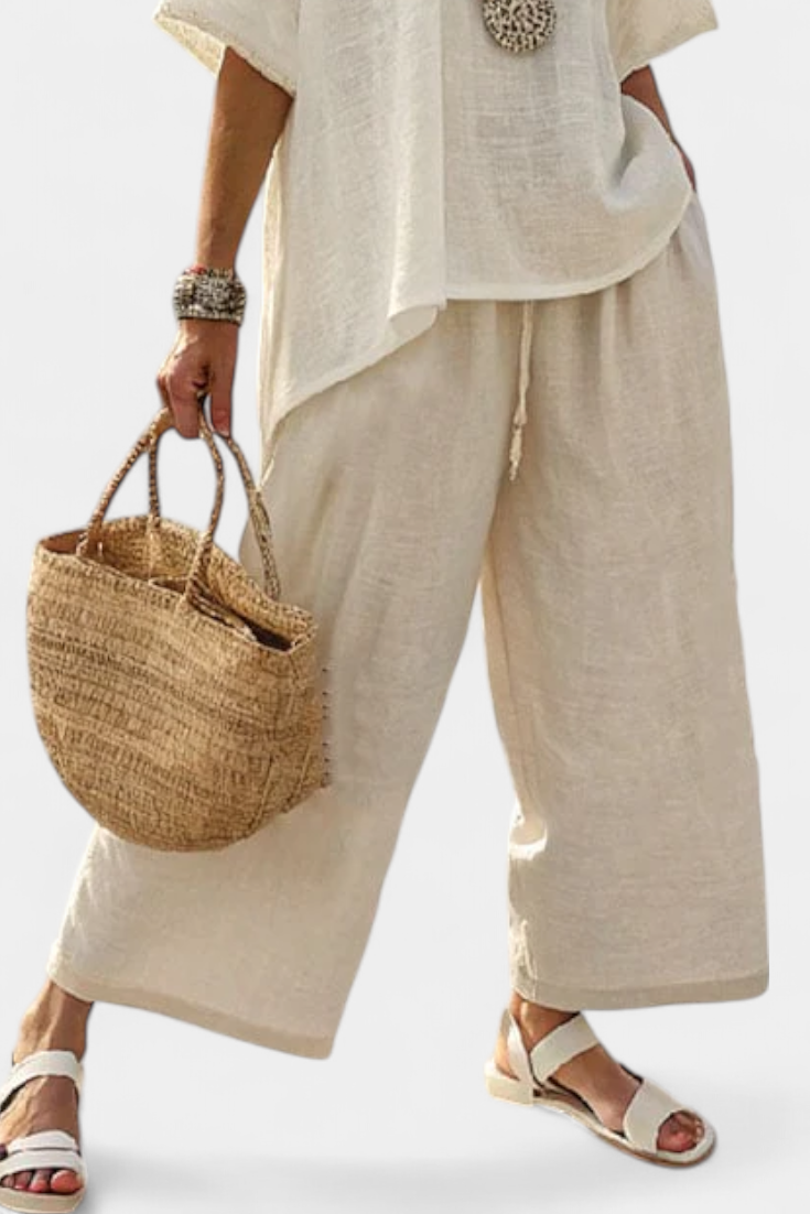 Ubesværet Minimalistisk Daisy Sæt: Oversized Bluse og Bredbenede Bukser i Naturlige Nuancer til et Chic, Elegant Udseende