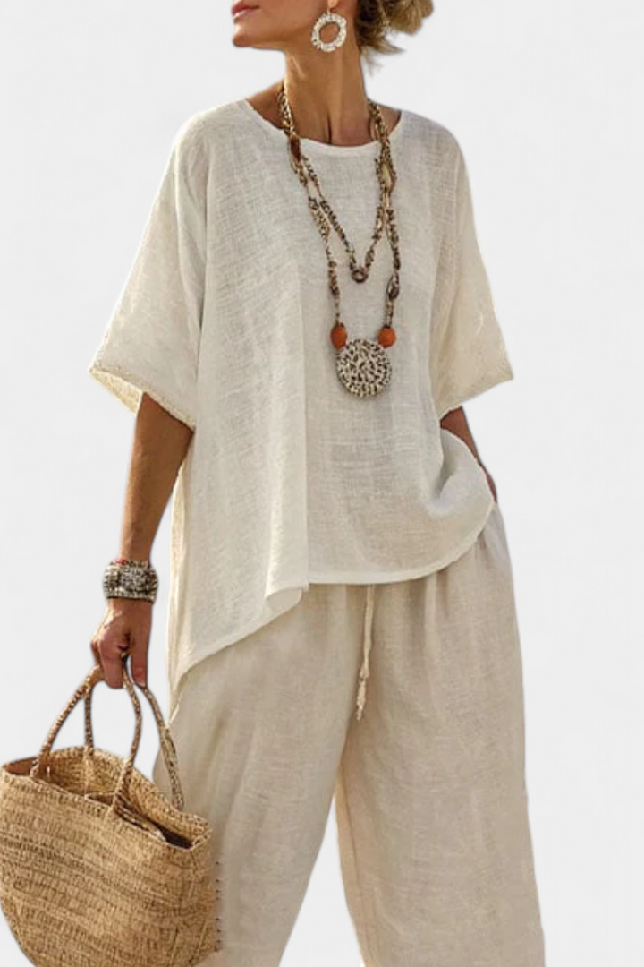 Ubesværet Minimalistisk Daisy Sæt: Oversized Bluse og Bredbenede Bukser i Naturlige Nuancer til et Chic, Elegant Udseende